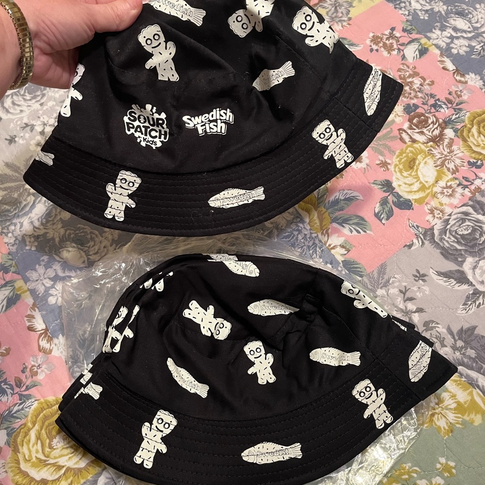 Brand new lot of 7 glow in the dark bucket hats featuring sour patch kids